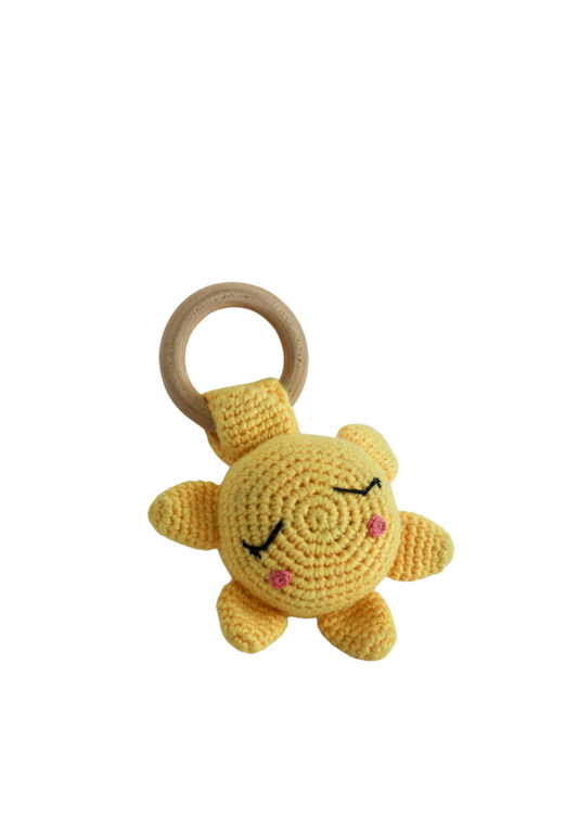Shake up your playtime with this crochet yellow sun rattle! Adorned with a sweet sun face, this squishy rattle creates a soothing sound when it's shaken, making it the perfect extra-special toy for your little one!