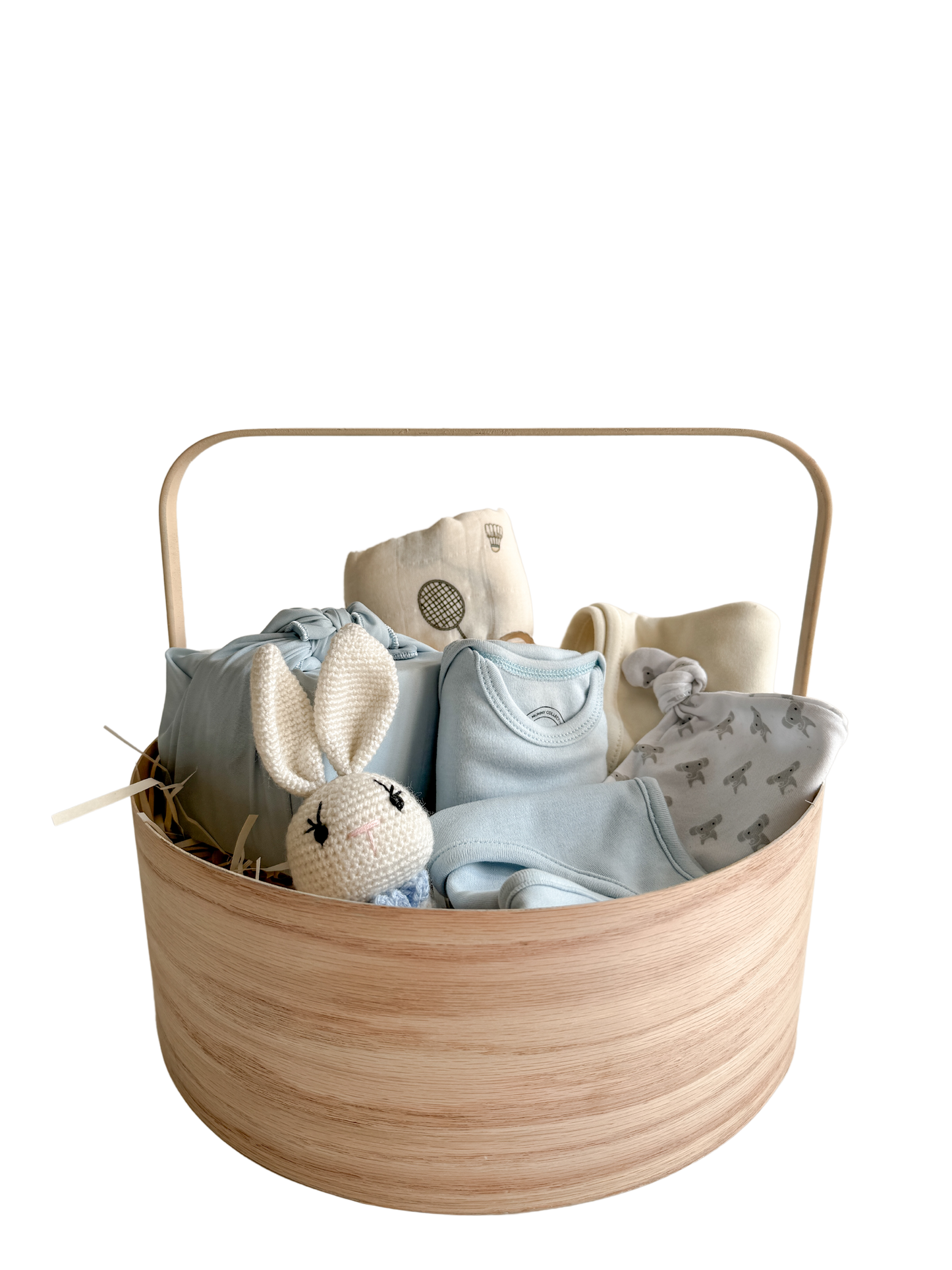 A thoughtful blend of treats for both baby and mama. This chic hamper features essentials for the newest addition to the family, including a soft baby cap, an adorable blue onesie, a stylish bib, and a practical burp cloth – all in delightful blue hues.