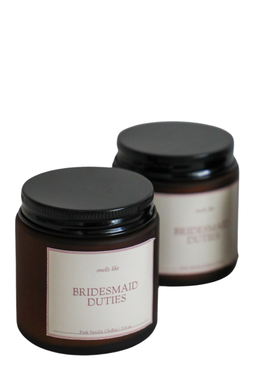 Light up your bridesmaid's day with our Bridesmaid Duties Candle! This stylish and meaningful gift features the words "bridesmaid duties" printed on the candle, making it the perfect way to thank them for their support on your special day. Show them your appreciation with this thoughtful and unique gift.